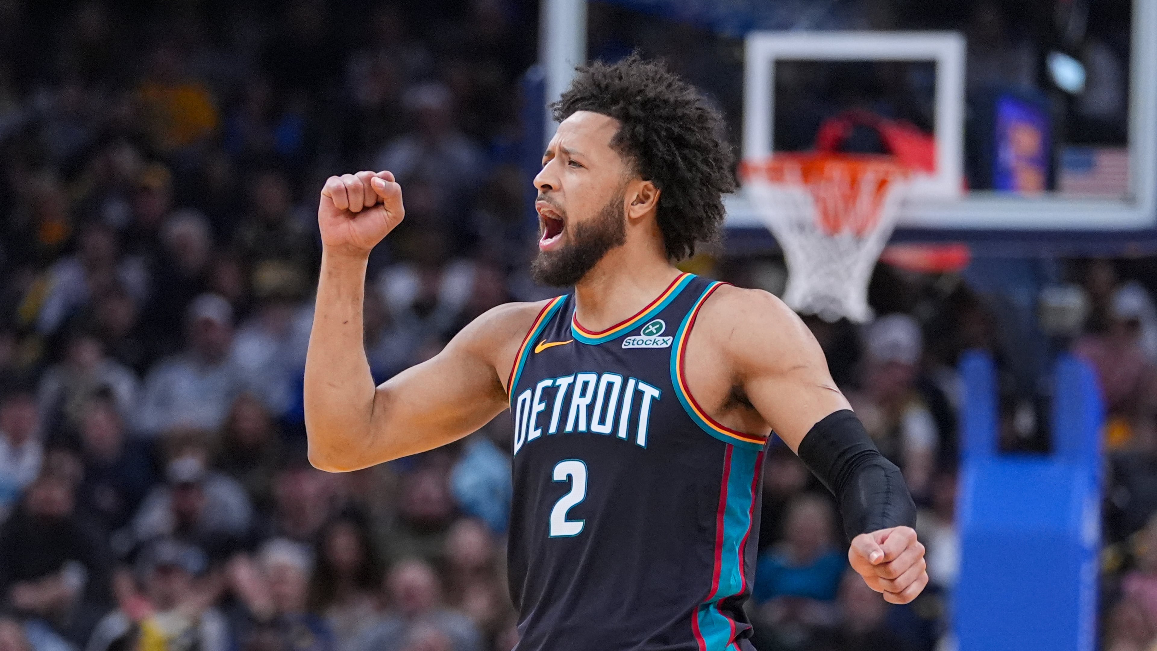 Detroit Pistons guard Cade Cunningham (2) celebrates during the first half of an NBA basketball game against the Indiana Pacers in Indianapolis, Monday, Nov. 24, 2025. (AP Photo/Michael Conroy)