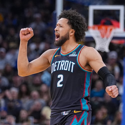 Detroit Pistons guard Cade Cunningham (2) celebrates during the first half of an NBA basketball game against the Indiana Pacers in Indianapolis, Monday, Nov. 24, 2025. (AP Photo/Michael Conroy)