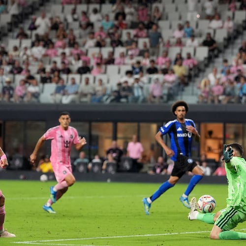 Inter Miami forward Luis Suarez scores his side's fourth goal past CF Montreal goalkeeper Thomas Gillier (31) during the second half of an MLS soccer match, Saturday, Aug. 29, 2026, in Miami. (AP Photo/Rebecca Blackwell)