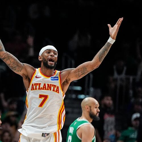 Atlanta Hawks guard Nickeil Alexander-Walker (7) celebrates his three-point shot against the Boston Celtics in the second half of an NBA basketball game, Monday, March 30, 2026, in Atlanta. (AP Photo/Mike Stewart)