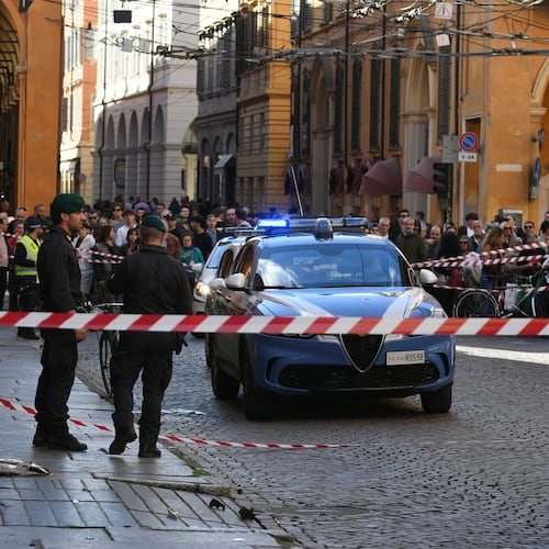Financial Police patrol a scene after a car incident in a street of Modena, Italy, Saturday, May 16, 2026. (Lapresse via AP)