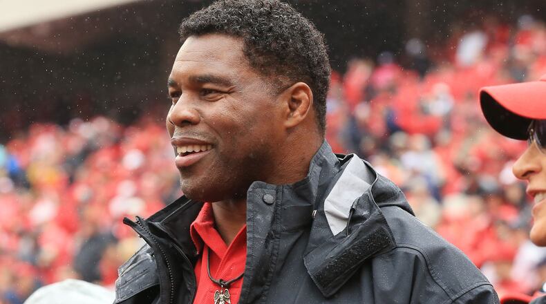 Former Georgia running back Herschel Walker attends a game at Sanford Stadium in Athens.