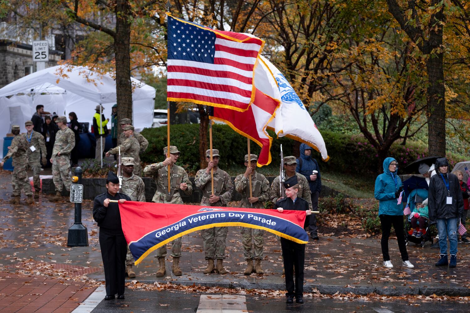 A color guard waits for the beginning of the 42nd annual Georgia Veterans Day Parade in Midtown Atlanta on Saturday, Nov. 11, 2023.   (Ben Gray / Ben@BenGray.com)