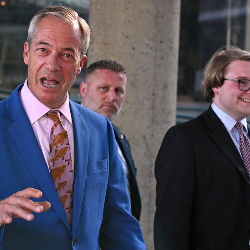 Britain's Reform UK leader Nigel Farage leaves Milbank Tower after he said he'll quit his Parliament seat and seek reelection in London, Tuesday, July 7, 2026.(AP Photo/Thomas Krych)