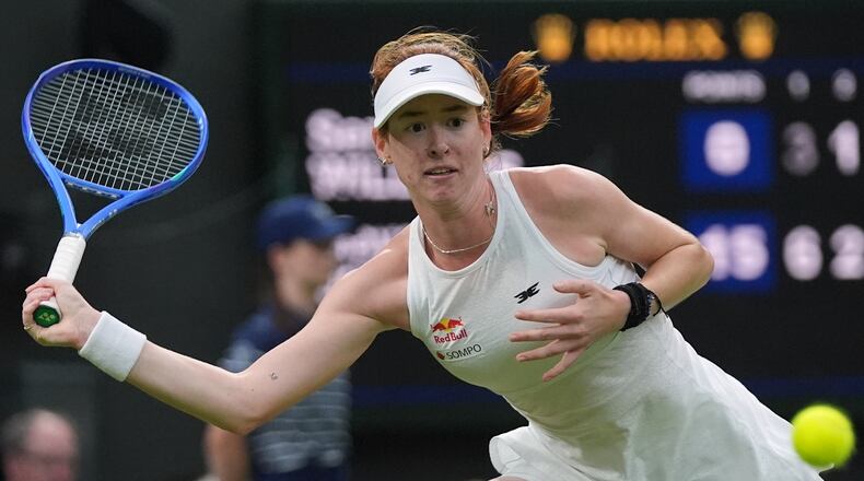 Maya Joint of Australia returns the ball to Serena Williams of the United States in their first round women's singles match at the Wimbledon Tennis Championships in London, Tuesday, June 30, 2026. (AP Photo/Maja Smiejkowska)