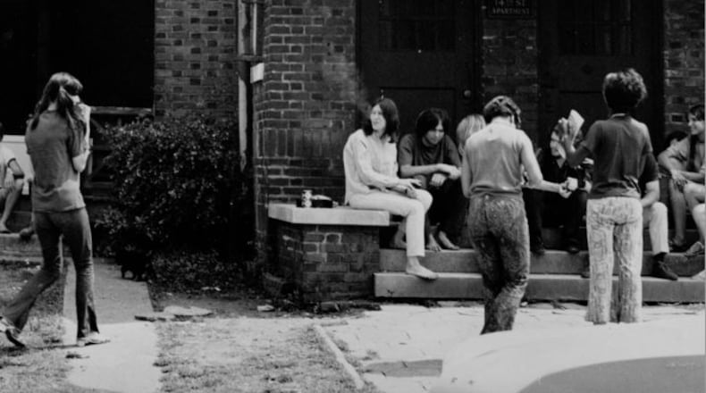 September 1968 -- Young people gather outside of a Midtown apartment complex on 14th Street.