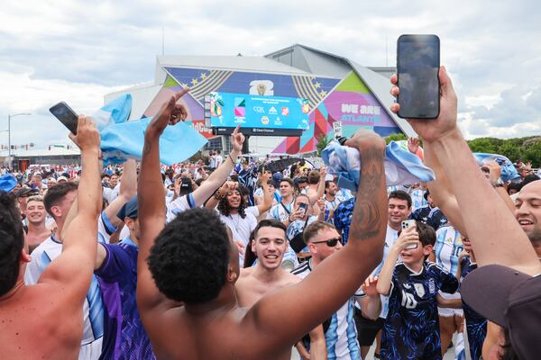 Argentina fans celebrate outside Atlanta Stadium (Mercedes-Benz Stadium) after Argentina wins the FIFA World Cup game between England and Argentina in Atlanta on July 15, 2026. It’s the last game Atlanta is hosting. Argentina won 2-1. (Arvin Temkar/AJC)