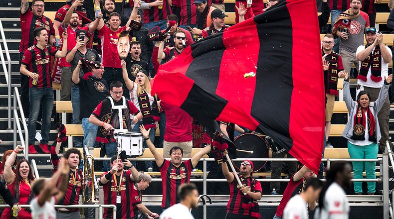 Atlanta United supporters celebrate their team’s goal against the Columbus Crew on Saturday, Feb. 18, 2017 in Charleston. (Photo by Alex Holt)