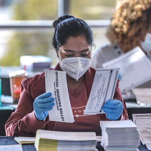 Fulton County election workers recount and rescan ballots again on Nov. 4, 2020 as the State and the Nation waited for the results. The U.S. Department of Justice on Thursday has requested Fulton County election records from 2020. (John Spink / AJC)
