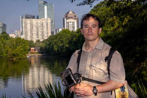 Photographer Kevin Gaston poses for a portrait at Piedmont Park in Atlanta on Saturday, July 1, 2023.  (Steve Schaefer/steve.schaefer@ajc.com)