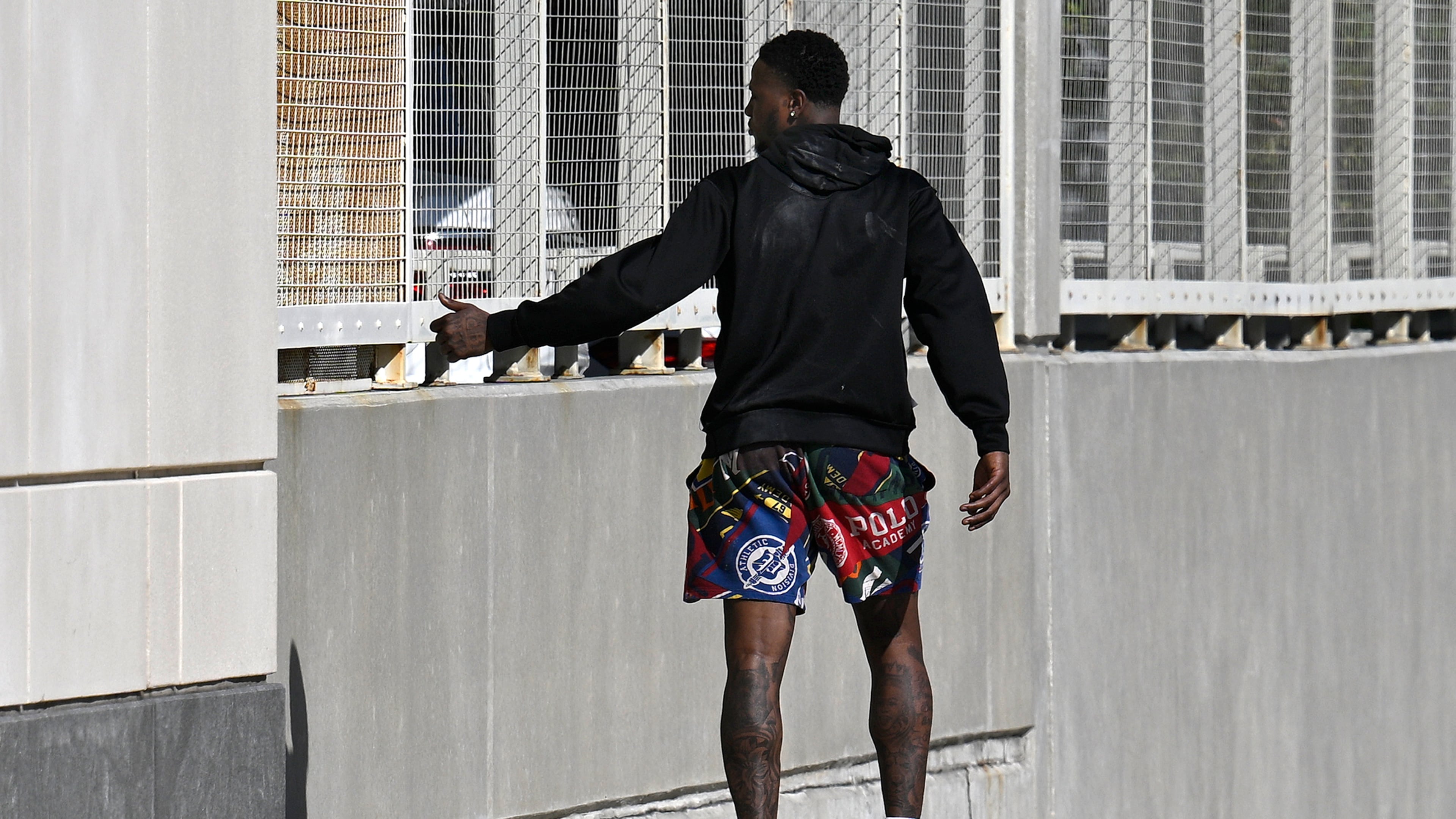 Miami Heat guard Terry Rozier leaves the U.S. Federal Courthouse through a side door after his arraignment, Thursday, Oct. 23, 2025, in Orlando, Fla. (AP Photo/Phelan M. Ebenhack)