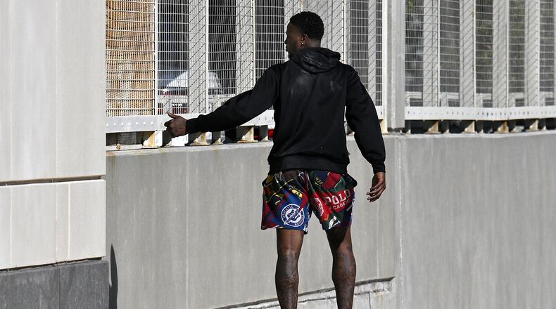 Miami Heat guard Terry Rozier leaves the U.S. Federal Courthouse through a side door after his arraignment, Thursday, Oct. 23, 2025, in Orlando, Fla. (AP Photo/Phelan M. Ebenhack)