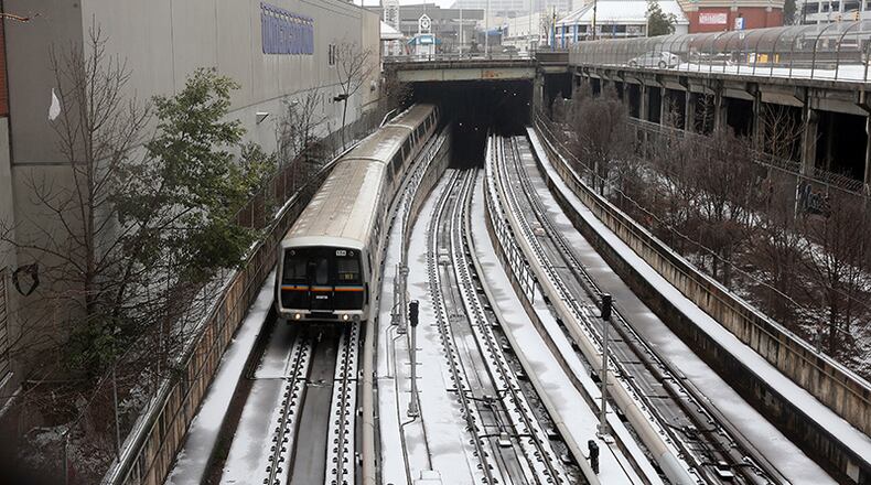 MARTA trains were running Wednesday, but experiencing some delays caused by the weather.