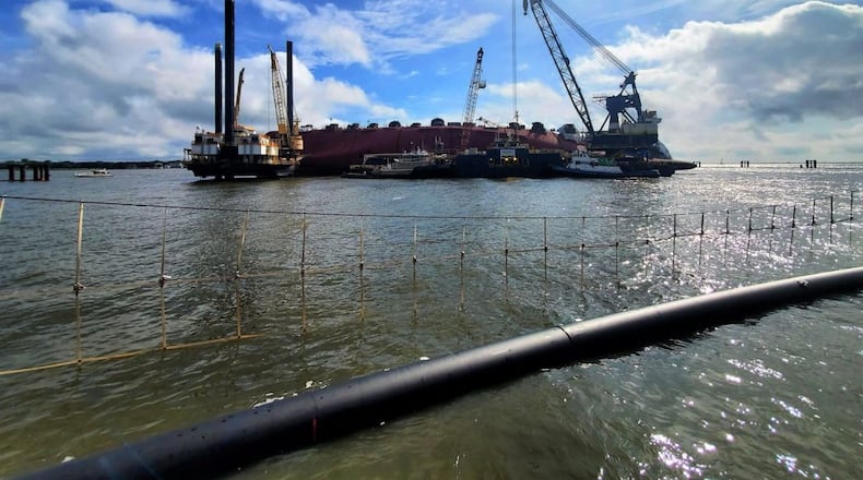 The fourth of 28 sections of environmental protection barrier netting was installed by St. Simons Sound Incident Response workers around the motor vessel Golden Ray in St. Simon’s Sound, Georgia, May 29, 2020. Made from soft, high-strength polyester straps sewn on a five-foot by five-foot grid, each custom-assembled panel ranges from 35 to 65 feet in height depending upon the depth to the seafloor, where it is weighted with heavy chain. The nets extend upward from the seabed and rise to above the water’s surface to catch potential debris from the ship’s removal while allowing marine life to swim safely through. Photo by Jaime Sanchez-Perez
