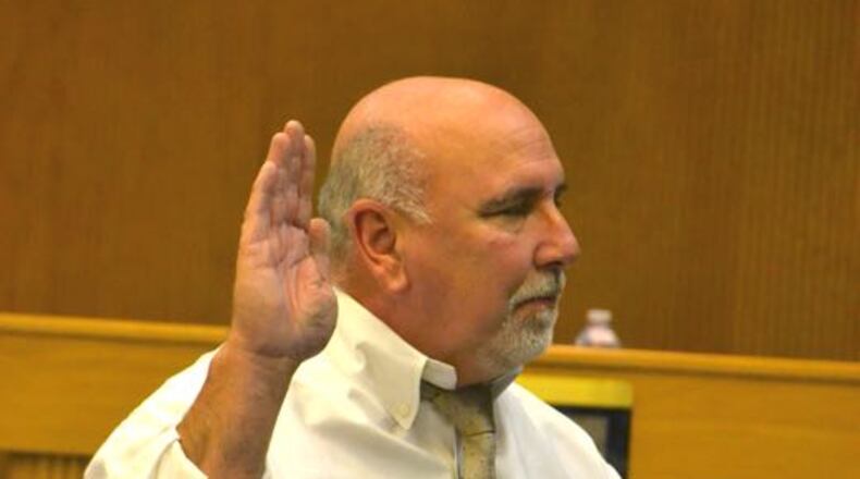 Eric Maxwell was sworn in to his District 1 post on the Fayette County Board of Commissioners Thursday night, and was subsequently chosen as chairman. Photo by Jill Howard Church for the AJC