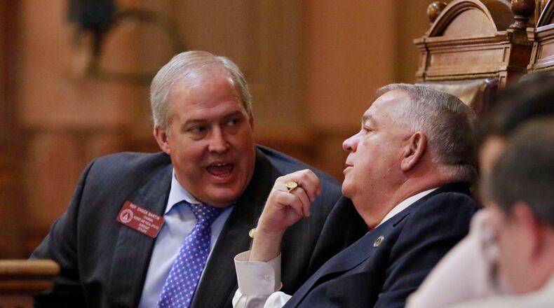 Mar. 22, 2016 - Atlanta - Rep. Chuck Martin (R - Alpharetta) confers with Speaker David Ralston as the House goes into the evening. Today, Tuesday, is Day 39 of the 40-day legislative session. Both the Senate and the House have full calendars and are expected to go late into the evening. BOB ANDRES / BANDRES@AJC.COM