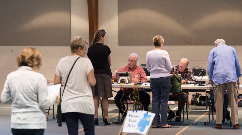 Voters wait in line at Mount Zion United Methodist Church in Marietta on April 18, in the first round of voting to fill the Georgia 6th Congressional District’s vacant seat in the U.S. House. (DAVID BARNES / DAVID.BARNES@AJC.COM)