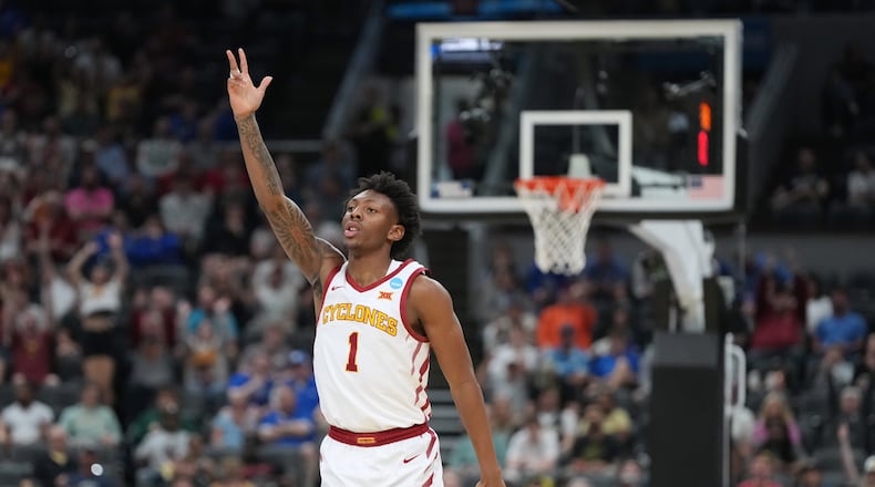 Iowa State's Jamarion Batemon (1) celebrates after making a 3-point basket during the second half in the second round of the NCAA college basketball tournament against Kentucky, Sunday, March 22, 2026, in St. Louis. (AP Photo/Jeff Roberson)