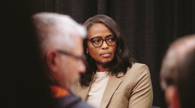 University of Virginia athletic director Carla Williams fields questions from reporters during a news conference organized by the University Athletic department on Tuesday in Charlottesville, Va. Three members of the Virginia football team were killed and two others wounded as they returned from a class field trip Sunday night. (Eze Amos/The New York Times)