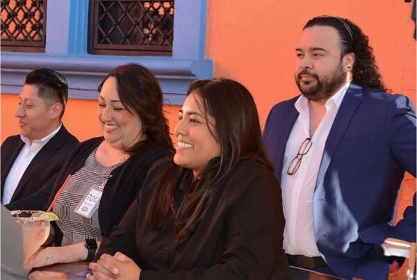Monica Caro (second from right) and other Latino community members attend a Dalton voter registration event. “A lot of Hispanics don’t want to vote because they think it doesn’t make a difference. But it does,” she says. (Courtesy of Monica Caro)