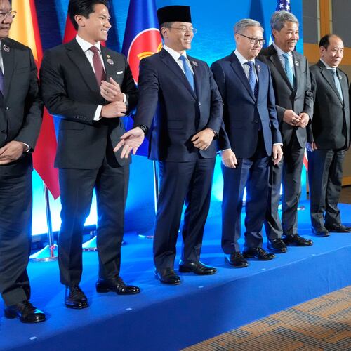 U.S. Secretary of State Marco Rubio, right, arrives for a group photo session during the ASEAN Post Ministerial Conference with the United States on the sidelines of the Association of Southeast Asian Nations (ASEAN) Foreign Ministers' Meeting in Pasay city, Metro Manila, Philippines Wednesday, July 22, 2026. (AP Photo/Aaron Favila, Pool)