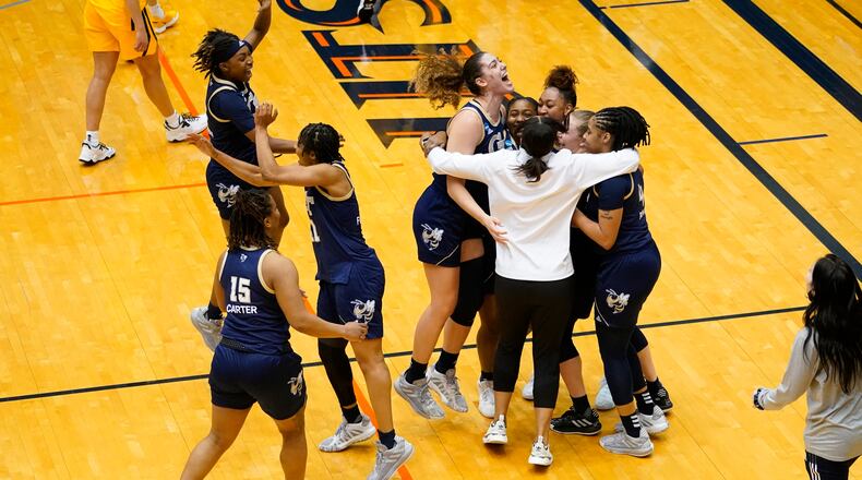 Georgia Tech players celebrate their win over West Virginia in the second round of the NCAA women's Tournament Tuesday, March 23, 2021, at the UTSA Convocation Center in San Antonio, Texas. (Scott Wachter/NCAA)