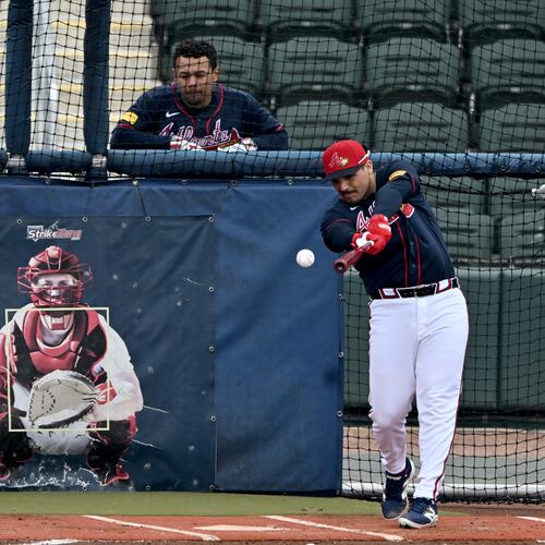 Braves infielder Nacho Alvarez Jr. — pictured taking batting practice Friday, Feb. 13, 2026 — started spring training by learning how to be a catcher but played in five games at third base. (Hyosub Shin/AJC)