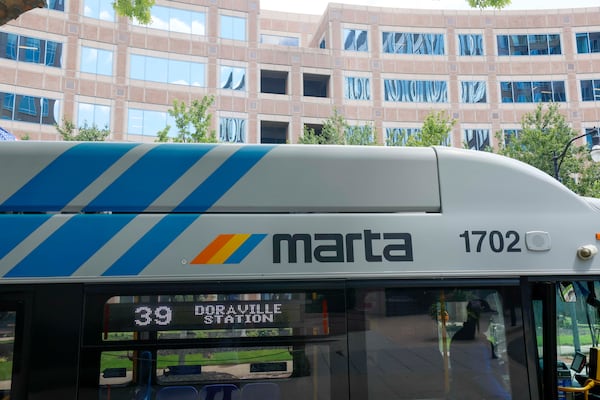 A MARTA bus is seen in front of the MARTA headquarters building in Atlanta last week. (Miguel Martinez/AJC)