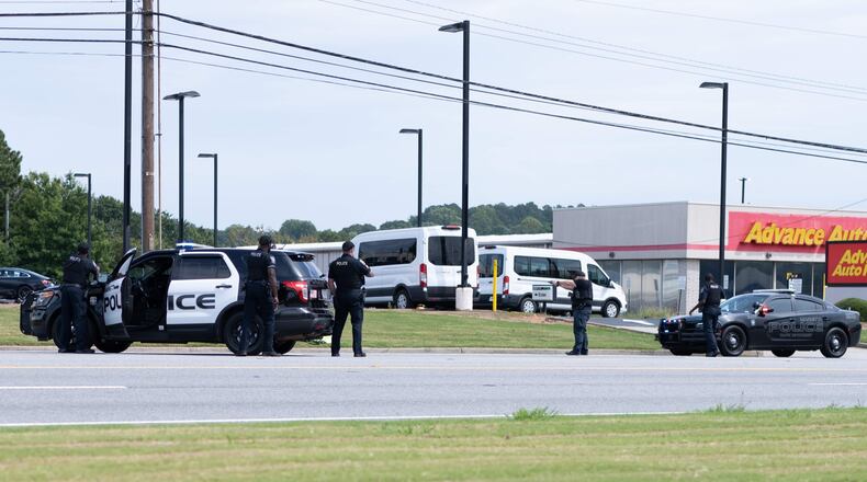 Marietta police detained a man covered in blood last week after seeing him walk away from a hammer attack and stabbing at a storage facility on Cobb Parkway. The man was later determined to be a good Samaritan who tried to stop the attack, according to police.