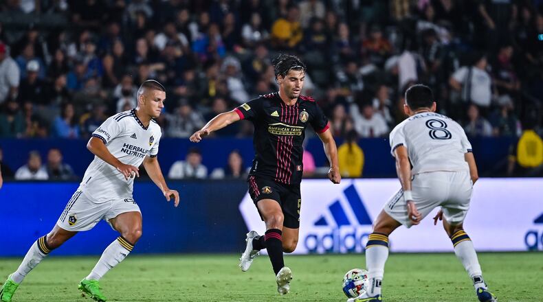Atlanta United's Santiago Sosa dribbles the ball during the second half of the match against the L.A. Galaxy on Sunday night in Carson, Calif.. (Photo by Dakota Williams/Atlanta United)