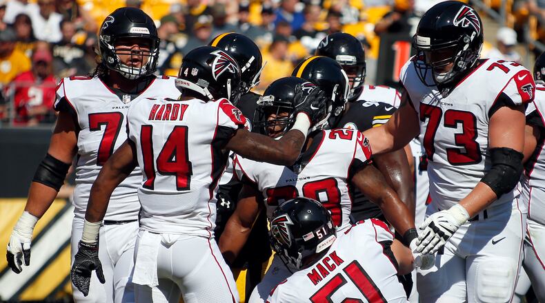 PITTSBURGH, PA - AUGUST 20: Terron Ward #28 of the Atlanta Falcons celebrates with teammates after rushing for a 5 yard touchdown in the first quarter against the Pittsburgh Steelers during a preseason game at Heinz Field on August 20, 2017 in Pittsburgh, Pennsylvania. (Photo by Justin K. Aller/Getty Images)