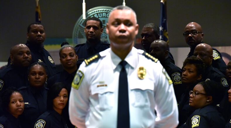 The Atlanta Public Schools Police Department Chief Ronald Applin, center, and the school district’s police officers are shown in this 2016 photograph taken during a swearing-in ceremony for officers. The school district’s police department was founded in 2016. HYOSUB SHIN / HSHIN@AJC.COM
