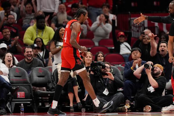 Houston Rockets' Jalen Green yells after making a basket while being fouled during the first half of an NBA basketball game against the Atlanta Hawks Tuesday, March 25, 2025, in Houston. (AP Photo/David J. Phillip)