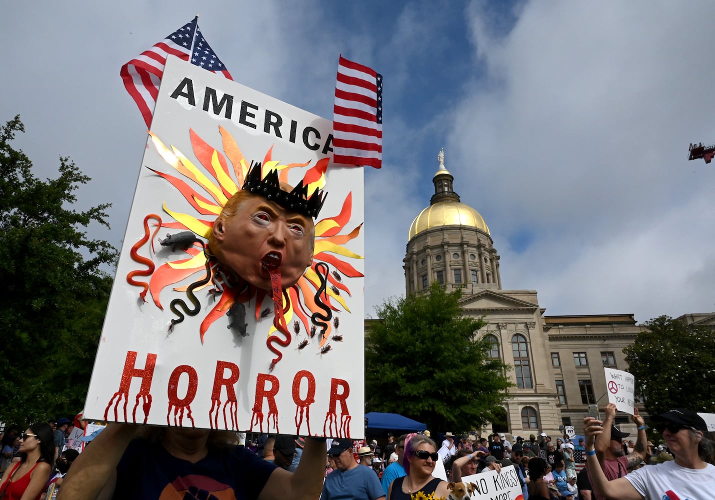 Protesters flood downtown Atlanta to oppose Trump, immigration policies