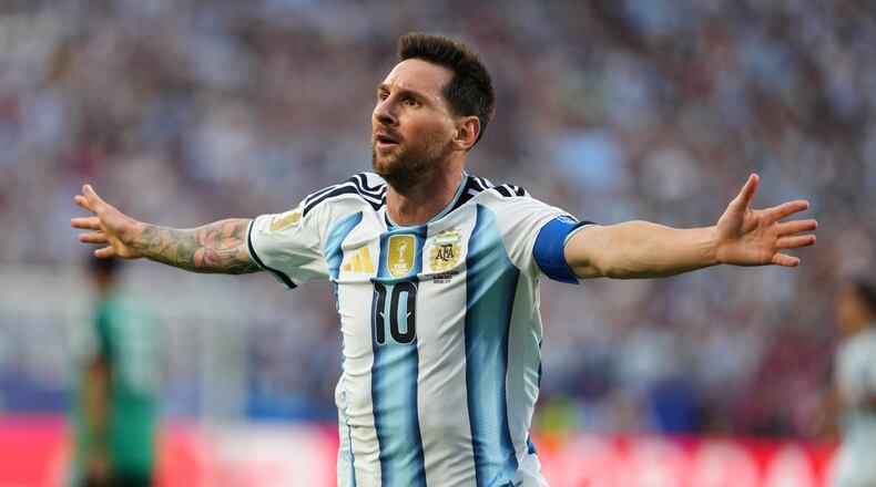 Argentina's Lionel Messi (10) celebrates after scoring the opening goal during the World Cup Group J soccer match between Argentina and Algeria in Kansas City, Mo., Tuesday, June 16, 2026. (AP Photo/Ed Zurga)