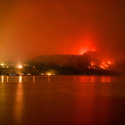 The Bald Range wildfire, that has forced people out of their homes in the south Okanagan region, burns in Summerland, B.C., late Saturday, Aug.8, 2026. (Darryl Dyck/The Canadian Press via AP)