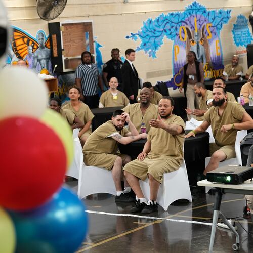 Rikers Island inmates react as they watch the World Cup semifinal soccer match between England and Argentina, at the jail complex in New York, Wednesday, July 15, 2026. (AP Photo/Seth Wenig)