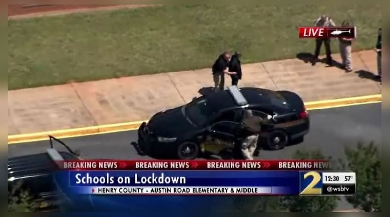 Two Henry County schools were put on lockdown after authorities said they heard about a domestic situation in the area.