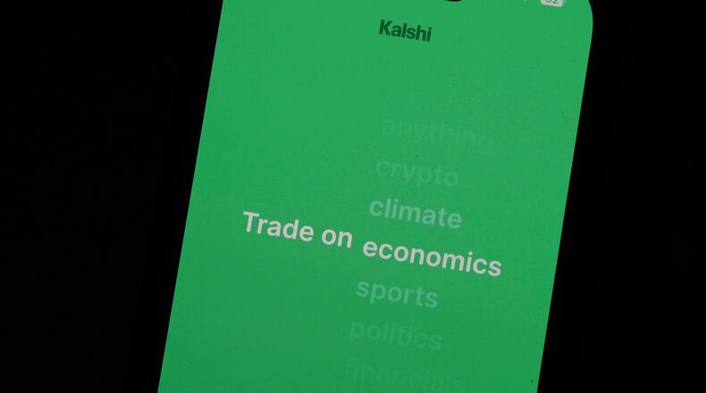 FILE - The prediction market app Kalshi is displayed on a mobile phone, April 16, 2026, in Chicago. (AP Photo/Erin Hooley, File)