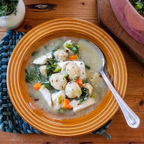 Enjoy more vegetables and whole grains in this nutritous version of chicken and dumplings. (Virginia Willis for the AJC)