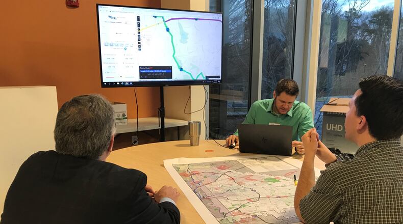 DeKalb County residents work on a public transit exercise during an open house on Feb. 28, 2019, at the Central DeKalb Senior Center. The open house, one of three this week, allowed residents a chance to provide input on the creation of a new Transit Master Plan. TIA MITCHELL/TIA.MITCHELL@AJC.COM