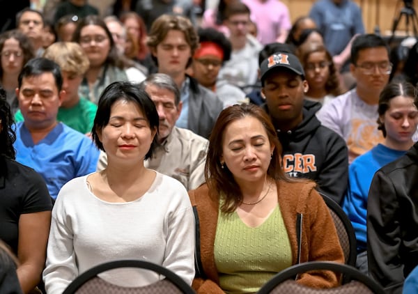 Some 250 people attended a talk at Mercer University by Buddhist monk Bhante Dam Phommasan, who was injured last fall in a cross-country "Walk for Peace." (Jason Vorhees/The Macon Melody)