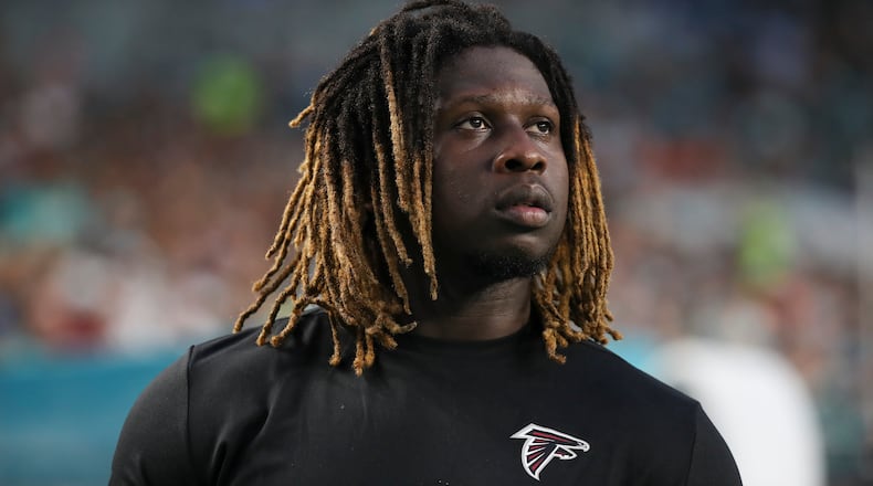 Atlanta Falcons defensive end Takkarist McKinley (98) looks on from the bench during exhibition against the Miami Dolphins Thursday, Aug. 10, 2017 in Miami Gardens, Fla.