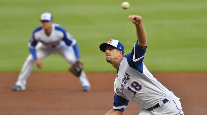 Braves starting pitcher Drew Smyly (18) delivers a pitch against Philadelphia Phillies in the first inning Sunday, April 11, 2021, at Truist Park in Atlanta. (Hyosub Shin / Hyosub.Shin@ajc.com)