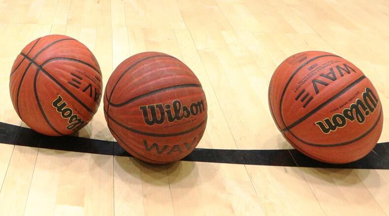 3 High School basketballs panoramic (stock)