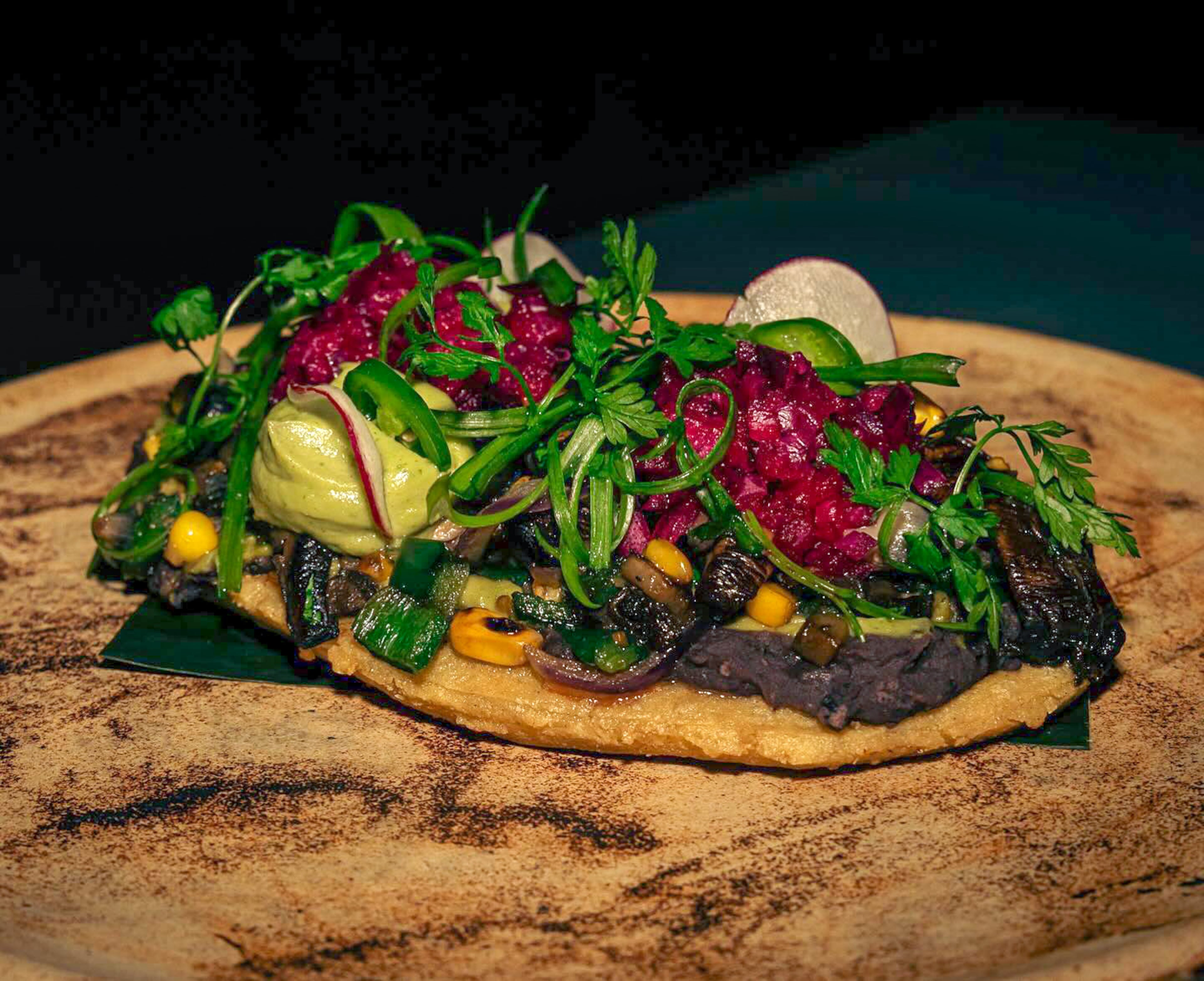 Pata Negra's Huarache Camino Real is a vegetarian dish of mushrooms, corn and beans over a thick, primitive-style masa tortilla. (Courtesy of Pata Negra)