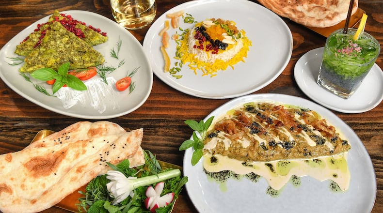 Plated dishes (from top left to bottom right) at Persian Basket Kitchen & Bar in Johns Creek: Koko Shevid Baghali (Fava Bean and Dill Frittata), Morasa Rice (Jeweled Rice) and Kashke Bademjaan (Roasted Eggplant). Styling by executive chef Ermiya Rezai / Chris Hunt/FOR THE AJC