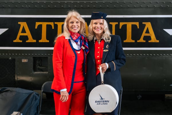 Twins June Cordell and Becky Christo wearing their first flight attendant uniforms from the 1970s during the "Antiques Roadshow" in Savannah, GA, on April 29, 2025. (Justin Taylor for The Atlanta Journal-Constitution)