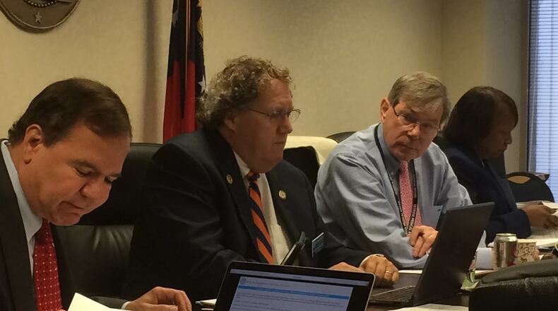 A new bill, expected to be passed into law by Gov. Brian Kemp, will require the Georgia Medical Composite Board to report how many physicians have been the subject of sexual misconduct investigations, including assault, abuse and exploitation. Pictured last year (from left) are board members Dr. John Antalis, Dr. John Jeffrey Marshall, and Dr. E. Dan DeLoach, and interim executive director LaSharn Hughes. (AJC file)