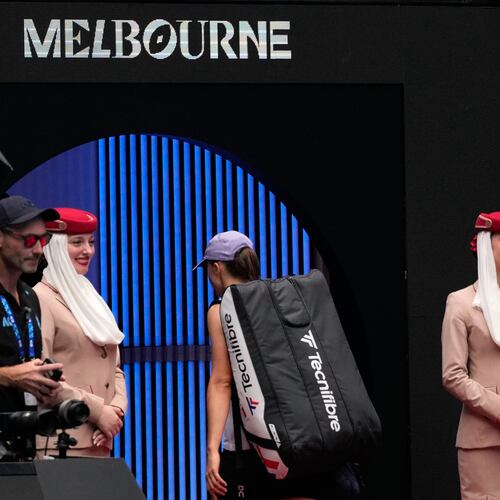 Iga Swiatek of Poland walks from the court following her quarterfinal loss to Elena Rybakina of Kazakhstan at the Australian Open tennis championship in Melbourne, Australia, Wednesday, Jan. 28, 2026. (AP Photo/Aaron Favila)